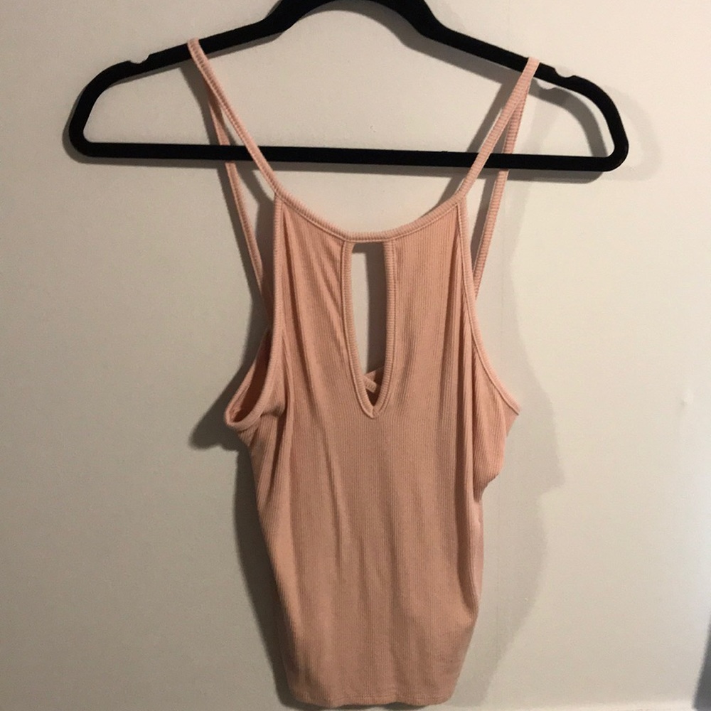 Key hole tank with criss cross back.